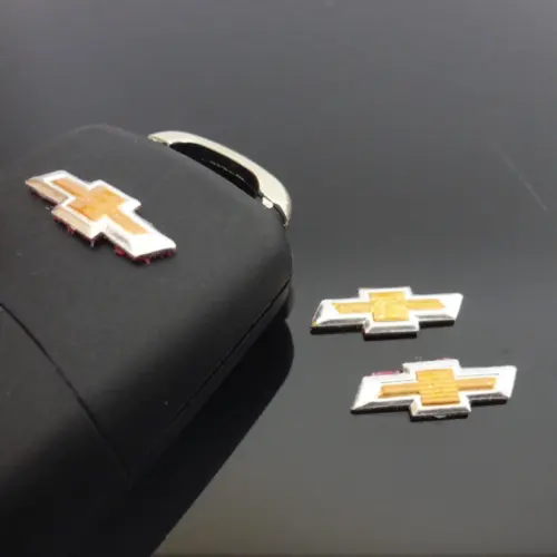 1x Chevrolet Aufkleber 3D Schlüssellogo 18mm Emblem Schriftzug Logo ALU