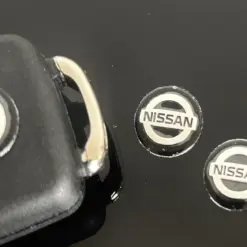 Alternative view of 1x NISSAN Schlüssel 14mm Aufkleber ALU Schlüssellogo Emblem Schriftzug LOGO