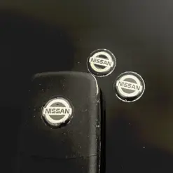 1x NISSAN Schlüssel 14mm Aufkleber ALU Schlüssellogo Emblem Schriftzug LOGO