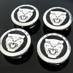 4x 56/55mm JAGUAR schwarz glänzend Rand Logo SILBER Felgendeckel Nabenkappen Rad Felgenkappen Nabendeckel Kappe